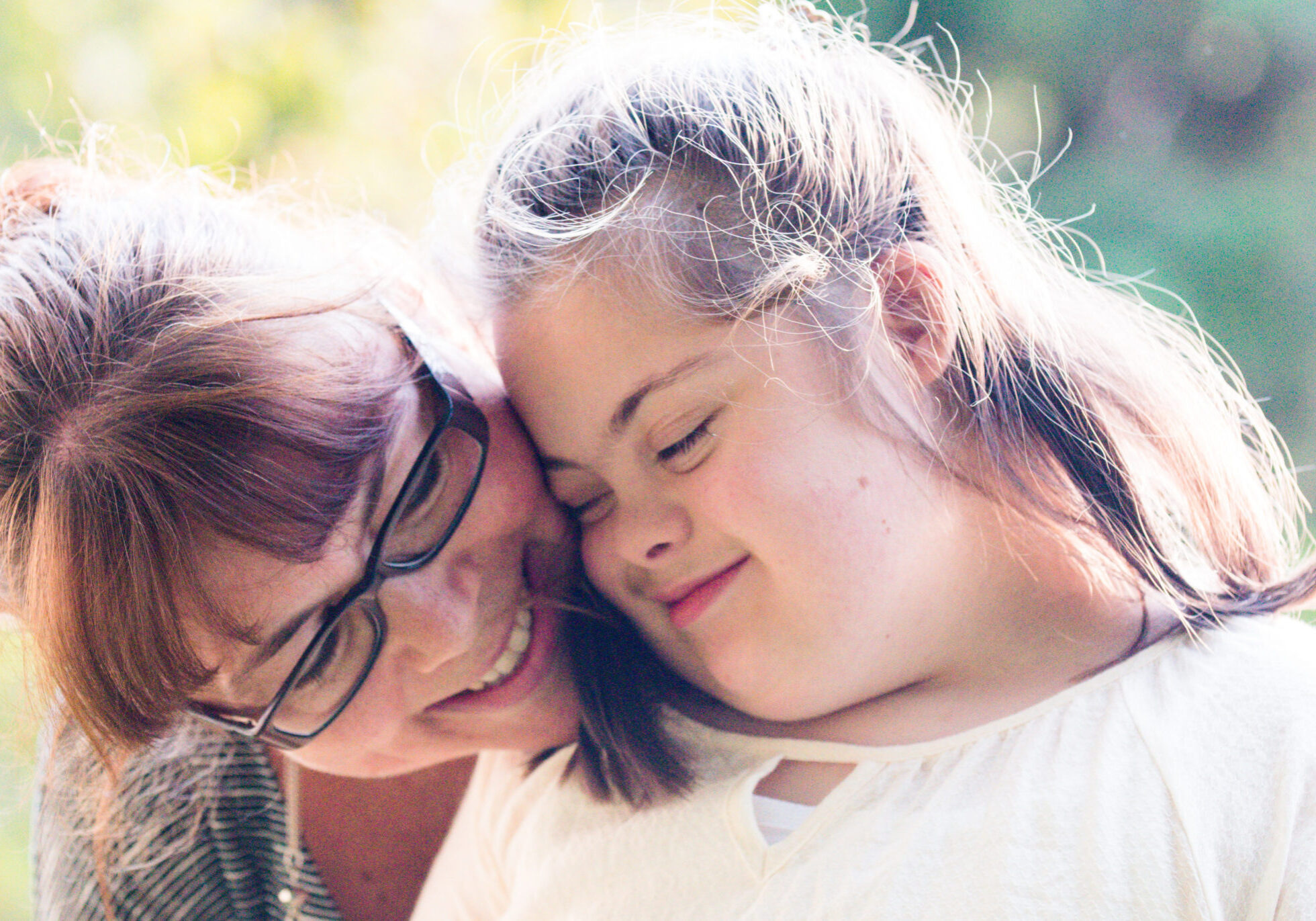 iStock-996380100 Woman and downs syndrome child Cropped